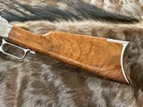 EXHIBITION, HAND-ENGRAVED UBERTI 1873 WINCHESTER IN THE WHITE SPORTING 45 COLT 20