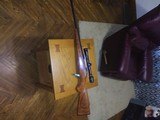 Very low round count super nice mossberg model 810 aht 30-06 look at the wood on this super nice rifle - 1 of 8