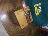 Very low round count super nice mossberg model 810 aht 30-06 look at the wood on this super nice rifle - 2 of 8