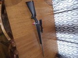 Like new browning a-bolt stainless 7mm remington magnum with leapold vx3 1.5×5×20 scope - 2 of 13