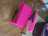 Like new Harrington and Richardson ultra rifle 308 with Nikon pro staff 3x9 scope laminated stock - 1 of 9