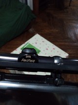 Like new only fired 3x Remington model 742 30-06 with redfield wide field 2-7 scope with factory covers - 14 of 15