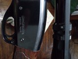 Like new only fired 3x Remington model 742 30-06 with redfield wide field 2-7 scope with factory covers - 13 of 15