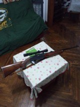 Like new only fired 3x Remington model 742 30-06 with redfield wide field 2-7 scope with factory covers - 1 of 15