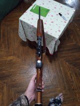 Like new only fired 3x Remington model 742 30-06 with redfield wide field 2-7 scope with factory covers - 3 of 15