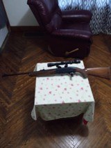 Very nice Remington model 742 with tasco scope low round count - 1 of 10