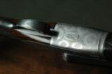 Boss 12 Bore Sidelock Ejector – Rare Round Body Action with Boss Patent Single Trigger and Sumner Engraving - 2 of 10