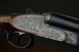 AyA Model 53 Sidelock in 20 Gauge with Fabulous Engraving and Wood - 28" Barrels and Long Stock - 1 of 9