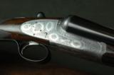 Boss 12 Bore Sidelock Ejector – Rare ROUND BODY Action with Boss Patent Single Trigger and Sumner Engraving - 1 of 10
