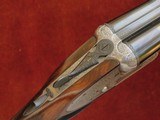 James Woodward & Sons 12 bore Bar Action Sidelock Ejector with Two Sets of Barrels - 1 of 11