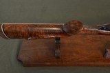 Winchester Model 21 Trap Grade
–
Highly Figured Wood with Roll Over Monte Carlo Custom Stock - Excellent - 7 of 10