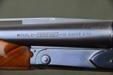 Winchester Model 21 Trap Grade
–
Highly Figured Wood with Roll Over Monte Carlo Custom Stock - Excellent - 3 of 10