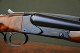 Winchester Model 21 Trap Grade
–
Highly Figured Wood with Roll Over Monte Carlo Custom Stock - Excellent - 1 of 10