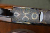 CSMC A-10 American 12 Gauge Sidelock Ejector Shotgun – Exquisite Rose & Scroll Engraving Signed by Richard Roy and Fabulous Case Coloring and Highly F - 2 of 15