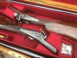 Magnificent James Purdey Pair 12 bore Back-Action Hammerguns - No's 8521 & 8522 in Original Case