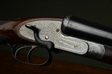 F.T. Baker 12 Bore Sidelock Ejector with Profuse Intricate Engraving and Sidelever Opening – Long Length of Pull - 1 of 12