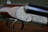 Handsome and Rare Dan’l Fraser & Son 12 Bore Boxlock Ejector – 30” Nitro Steel Barrels and 15-1/8” Stock – Extensively Engraved and Highly Figured Sto - 1 of 15