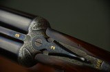 STEPHEN GRANT & SONS 12-BORE 'TWELVE-TWENTY' W. BAKER PATENT ASSISTED-OPENING SIDELOCK EJECTOR – No. 2 of a Pair - 1 of 13