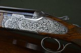 Handsome 12 Gauge Beretta Premium Grade SL3 Deep Chisel Sporter with 32” Barrels
- Cased with Accessories Including “Pure Gold” Choke Tubes - 1 of 15