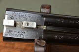 Stephen Grant & Sons 12 Bore Sidelock Ejector with Sidelever Opening – Great Engraving and Highly Figured Stock – 2-3/4” Chambers - No. 4 of a Quattro - 13 of 13