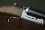 Ruger Gold Label Side-by-Side 12 Gauge Boxlock Ejector in Excellent Condition with Highly Figured Walnut - Original Box and Choke Tubes - 1 of 14
