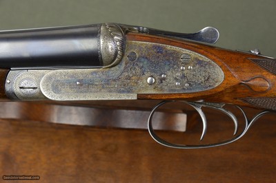 Frederick Beesley 12 Bore Sidelock Ejector with 30
Barrels
Sculpted Fences
Gorgeous Highly Figured French Walnut Stock