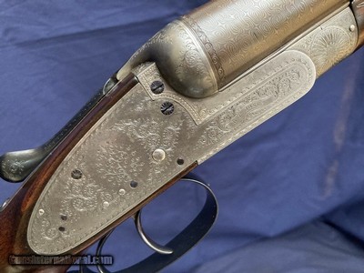 William Palmer Jones 12 Bore Back Action Sidelock Ejector with 30
Nitro Damascus Barrels
Highly Figured French Walnut