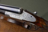 Boss & Co. 12 Bore Sidelock Ejector with 30” Barrels and Full Coverage Sumner Engraving and Highly Figured French Walnut Stock - 4 of 13