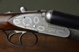 Boss & Co. 12 Bore Sidelock Ejector with 30” Barrels and Full Coverage Sumner Engraving and Highly Figured French Walnut Stock