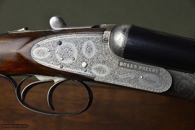 Boss & Co. 12 Bore Sidelock Ejector with 30
Barrels and Full Coverage Sumner Engraving and Highly Figured French Walnut Stock