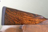 Boss & Co. 12 Bore Sidelock Ejector with 30” Barrels and Full Coverage Sumner Engraving and Highly Figured French Walnut Stock - 6 of 13