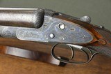 W&C Scott The Premier Gun 12 Bore Sidelock Ejector with Fabulous 14 Game Bird Engraving and 30
Highly Figured Damascus Barrels