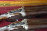 PAIR – Stephen Grant & Son 12 Bore Sidelock Ejectors with 30” Very Highly Figured Nitro Damascus Barrels and Highly Figured French Walnut - Image 1 of 12