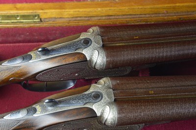 PAIR – Stephen Grant & Son 12 Bore Sidelock Ejectors with 30” Very Highly Figured Nitro Damascus Barrels and Highly Figured French Walnut - Image 1 of 12