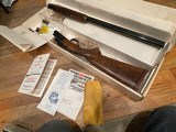 RUGER RED LABEL 20 GAUGE SHOTGUN WITH CHOKE TUBES AND BOX METAL IN GREAT CONDITION FULLY FUNCITONAL SHOTGUN. - 1 of 15