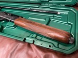 LIKE NEW REMINGTON 1100 410 GAUGE SHOTGUN WITH REMOVABLE REM CHOKE TUBE GUN IS LIKE NEW PERFECT ALL AROUND COMES WITH REMINGTON CASE - 13 of 15