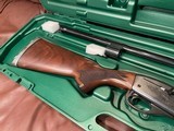 LIKE NEW REMINGTON 1100 410 GAUGE SHOTGUN WITH REMOVABLE REM CHOKE TUBE GUN IS LIKE NEW PERFECT ALL AROUND COMES WITH REMINGTON CASE - 2 of 15