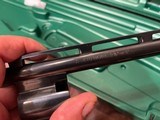 LIKE NEW REMINGTON 1100 410 GAUGE SHOTGUN WITH REMOVABLE REM CHOKE TUBE GUN IS LIKE NEW PERFECT ALL AROUND COMES WITH REMINGTON CASE - 4 of 15