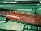 LIKE NEW REMINGTON 1100 410 GAUGE SHOTGUN WITH REMOVABLE REM CHOKE TUBE GUN IS LIKE NEW PERFECT ALL AROUND COMES WITH REMINGTON CASE - 8 of 15