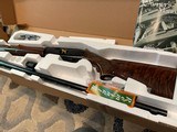 REMINGTON 1100 LT 20 SPORTING 20 ENGRAVED AND GOLD INLAYED SHOTGUN IN BOX WITH SUPER FANCY WOOD HARD TO FIND WITH REM CHOKES - 1 of 15