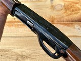 Remington 1100 semi auto 20 gauge shotgun, in great condition vent rib barrel works perfectly, super fancy wood - 9 of 15
