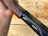 Remington 1100 semi auto 20 gauge shotgun, in great condition vent rib barrel works perfectly, super fancy wood - 10 of 15