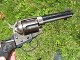 Antique Colt 1877 Lightning.38 Caliber. Excellent condition. Blue an Case Colors. Works Like New In DA and SA. 4 1/2