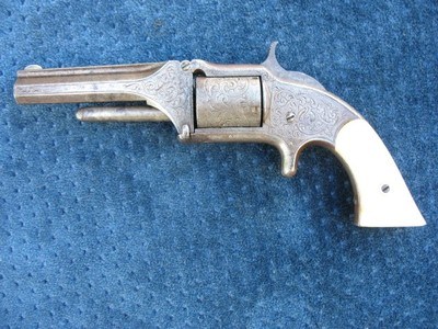 Antique Nimschke Engraved Smith & Wesson 1 1/2 Old Model or First Model.32 Rim Fire Excellent Pearl grips. Very Sharp Looking Gun.
