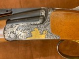 Perazzi RS Trap Combo Custom SCO GOLD engraved
31 1/2" / 34" - 3 of 17