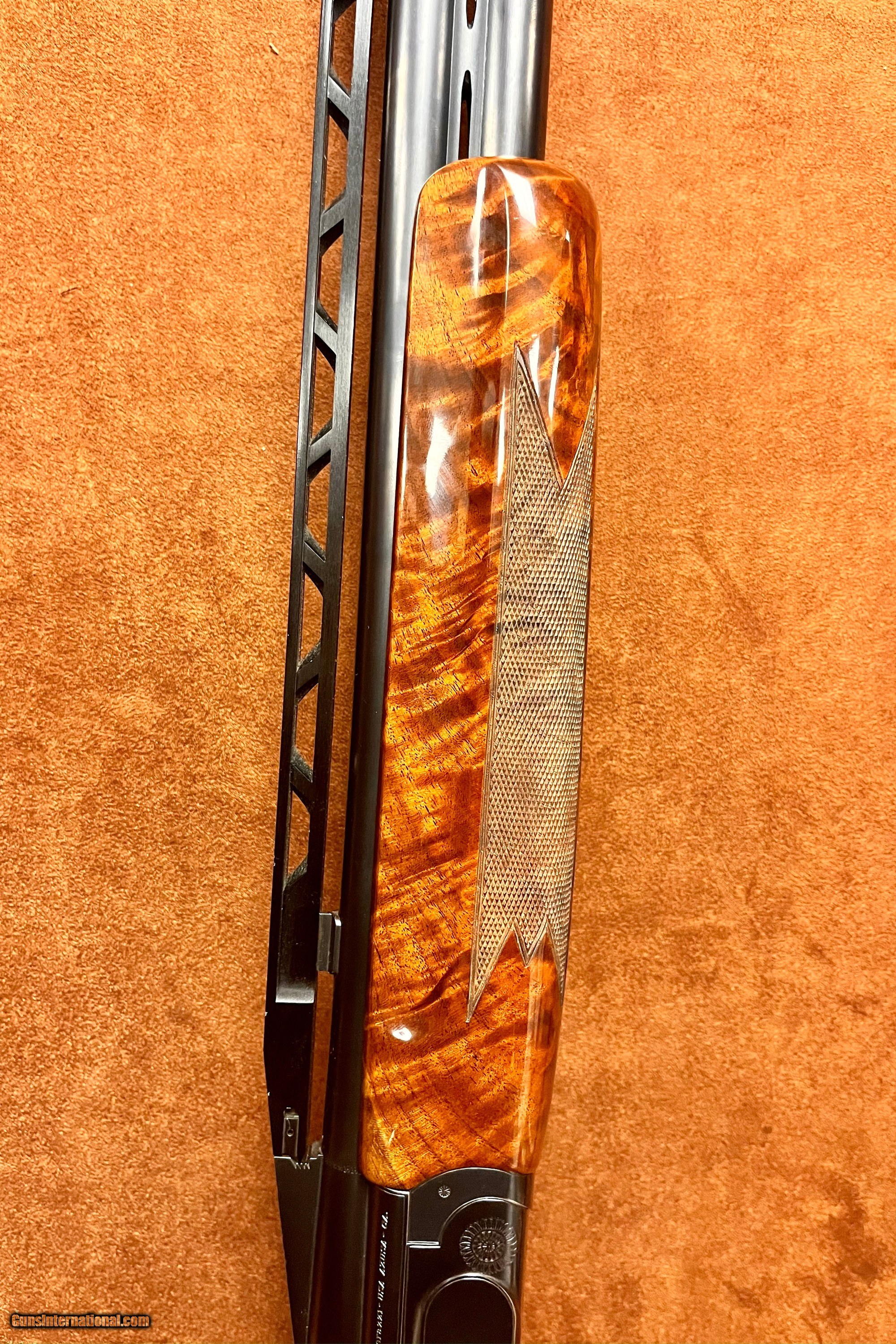 Perazzi MX10RS O/U Shotgun with spectacular exhibition grade stock upgrade