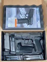 Sig Sauer SP2022 9MM with box and 4 Mags - 1 of 18