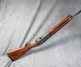 REMINGTON 1100 SPORTING 28 GA / 25" BBL - 2 of 2