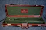 EXPOSITO SPANISH LEATHER COVERED CASE 20/ 28 GAUGE. - 1 of 2
