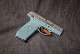 RUGER SR9c 9MM. TURQUOISE POLYMER FRAME & BRUSHED STAINLESS SLIDE - 3 of 3